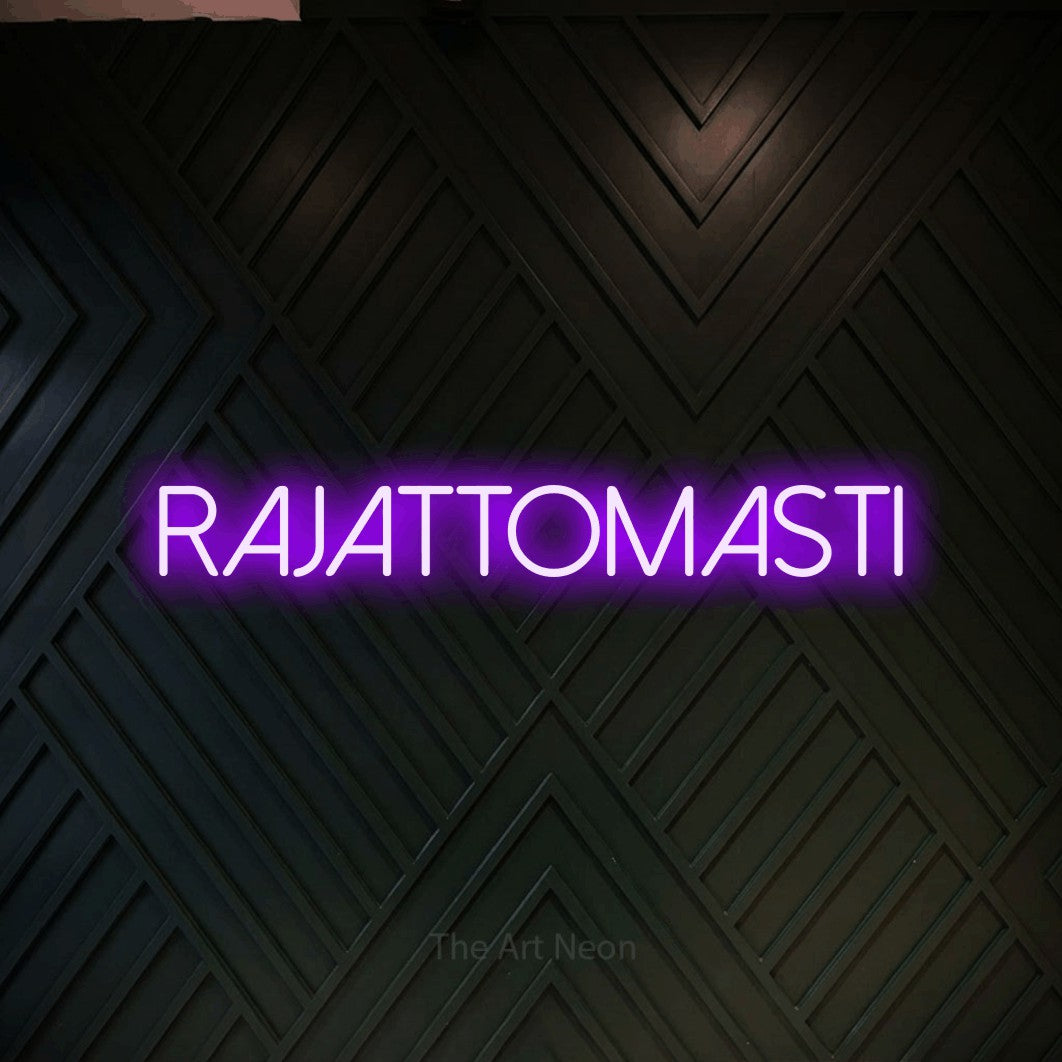 LED neon sign reading “RAJATTOMASTI”, arranged in a single line.
