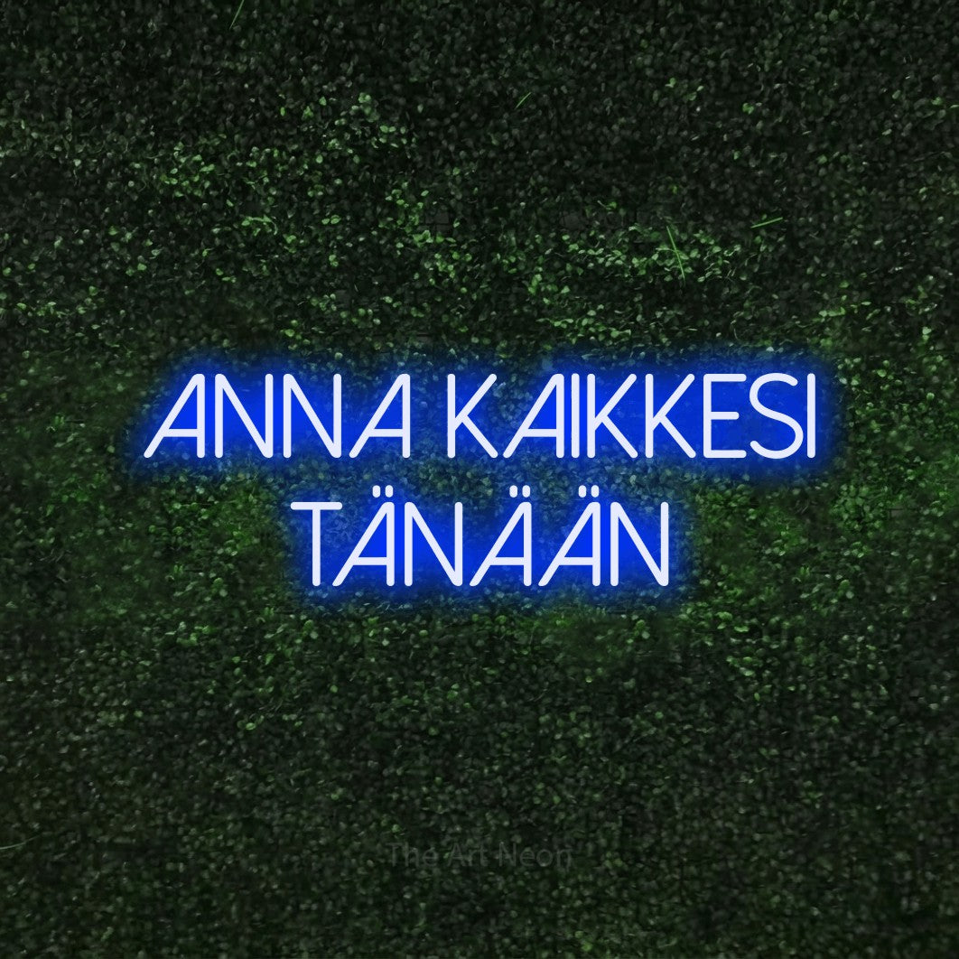 LED neon sign reading “anna kaikkesi TÄNÄÄN”, arranged in 2 lines.