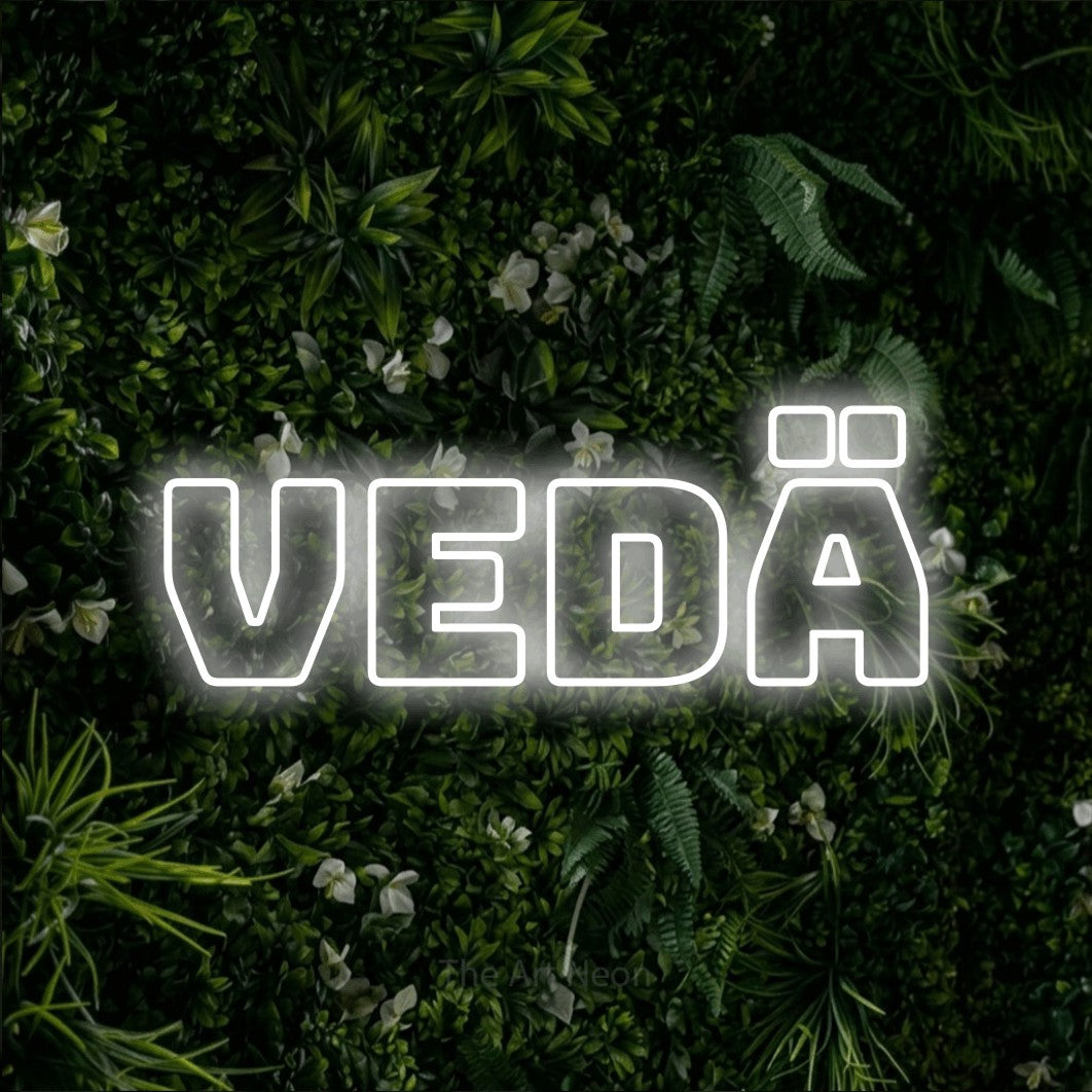 LED neon sign reading “Vedä”, arranged in a single line.