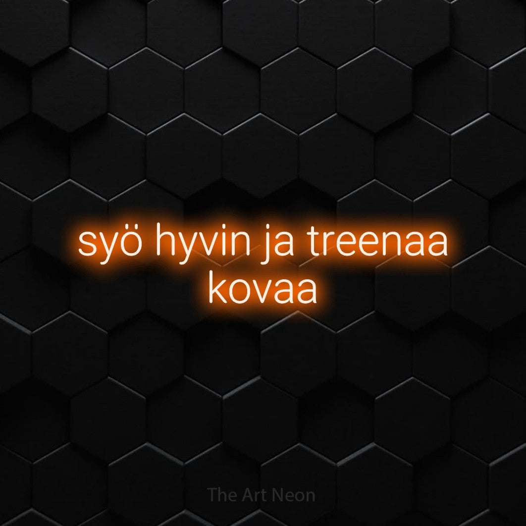 LED neon sign reading “syö hyvin ja treenaa kovaa”, arranged in 2 lines.