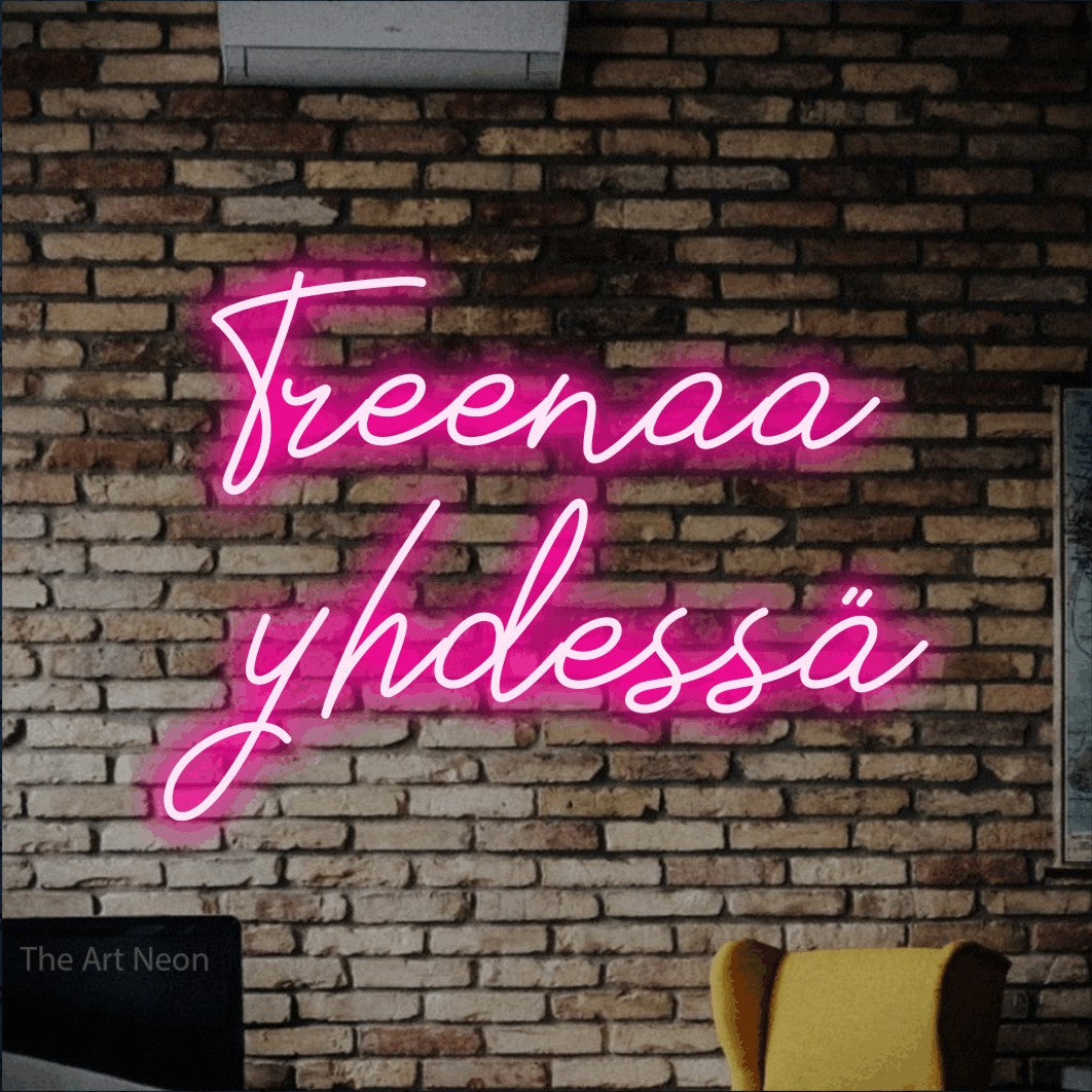 LED neon sign reading “Treenaa yhdessä”, arranged in 2 lines.