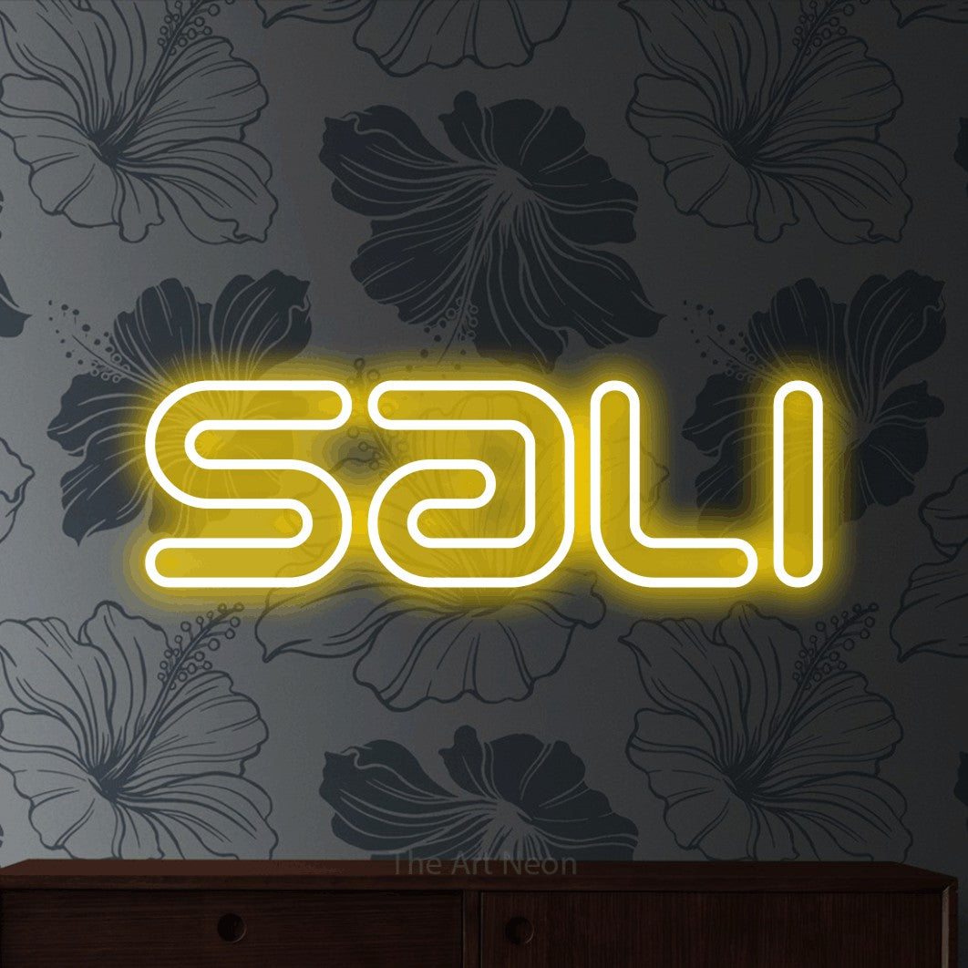 LED neon sign reading “Sali”, arranged in a single line.