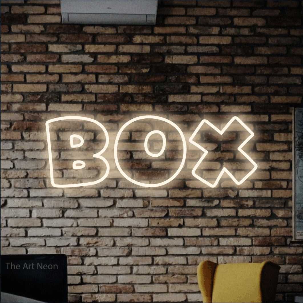 LED neon sign reading “Box”, arranged in a single line.