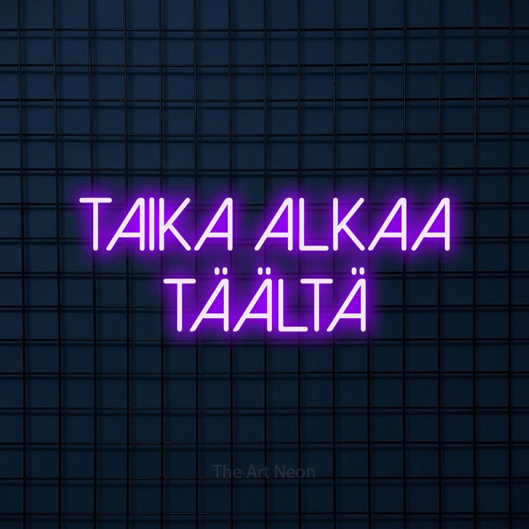 LED neon sign reading “Taika alkaa täältä”, arranged in 2 lines.