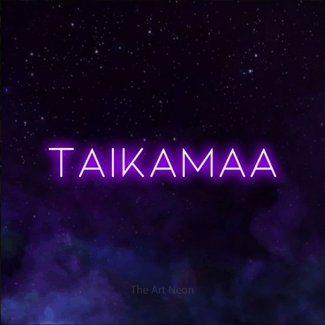 LED neon sign reading “taikamaa”, arranged in a single line.