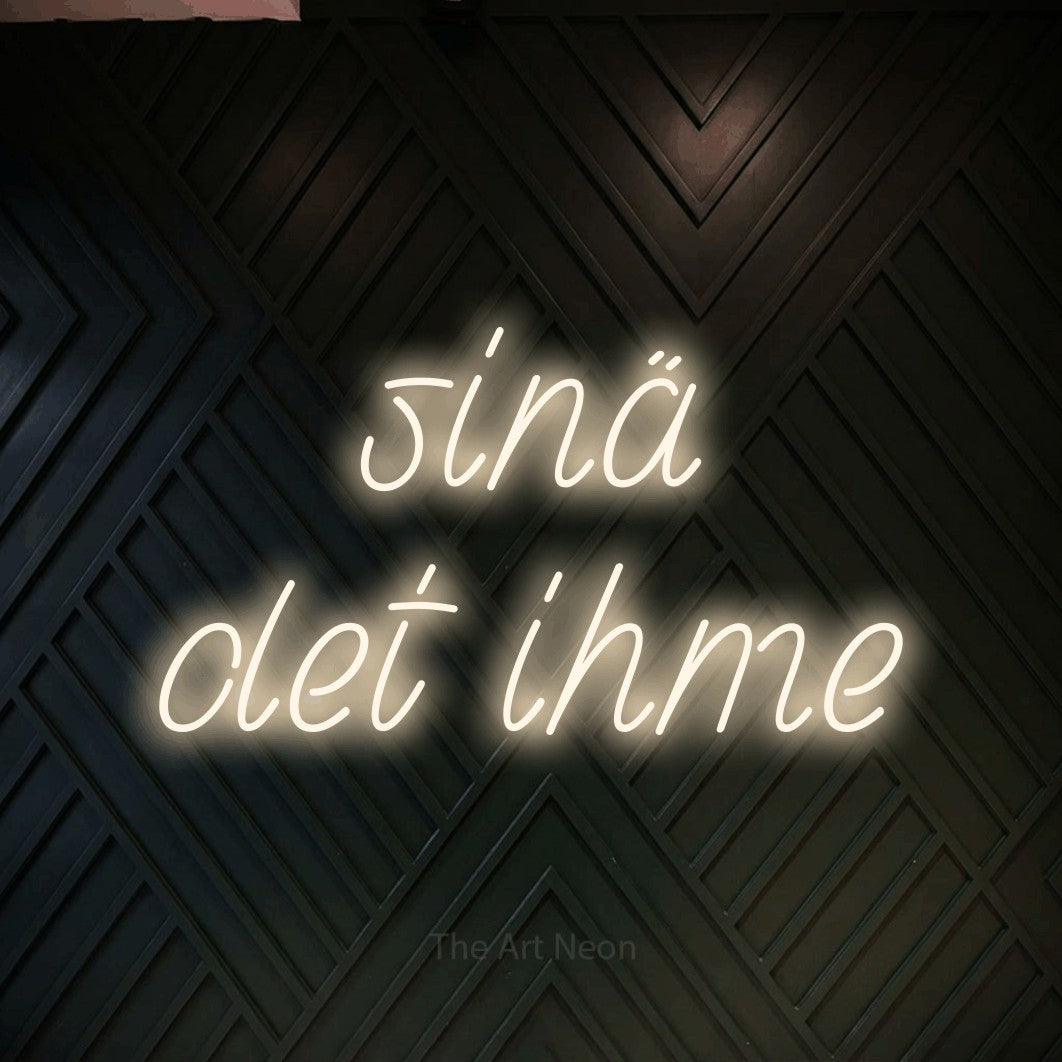 LED neon sign reading “sinä olet ihme”, arranged in 2 lines.