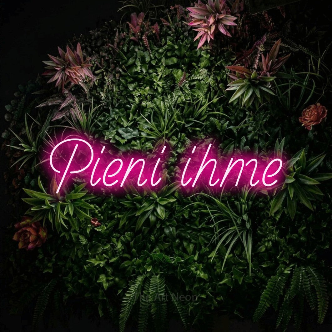LED neon sign reading “Pieni ihme”, arranged in a single line.