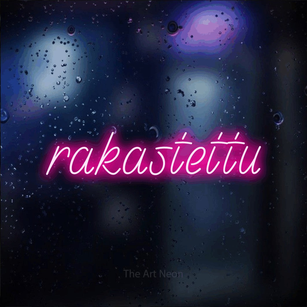 LED neon sign reading “rakastettu”, arranged in a single line.