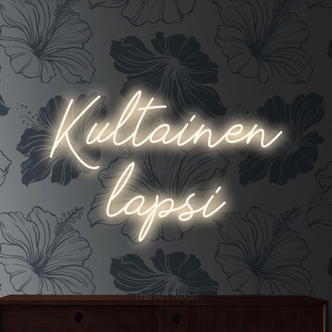 LED neon sign reading “Kultainen lapsi”, arranged in 2 lines.