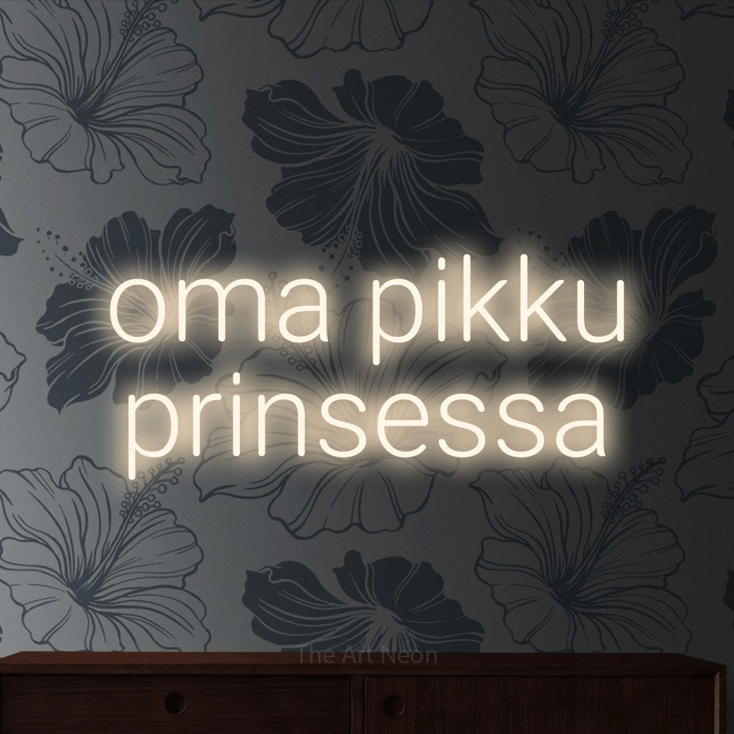LED neon sign reading “oma pikku prinsessa”, arranged in 2 lines.