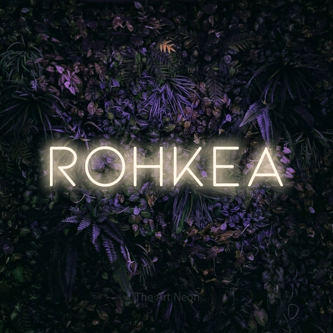 LED neon sign reading “Rohkea”, arranged in a single line.