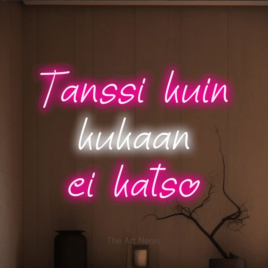 LED neon sign reading “Tanssi kuin kukaan ei katso”, arranged in 3 lines.