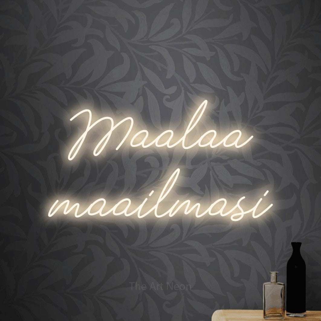 LED neon sign reading “Maalaa maailmasi”, arranged in 2 lines.