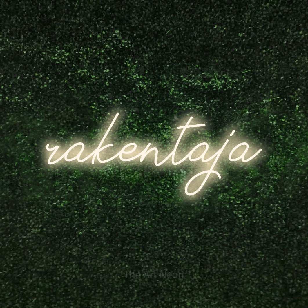 LED neon sign reading “rakentaja”, arranged in a single line.