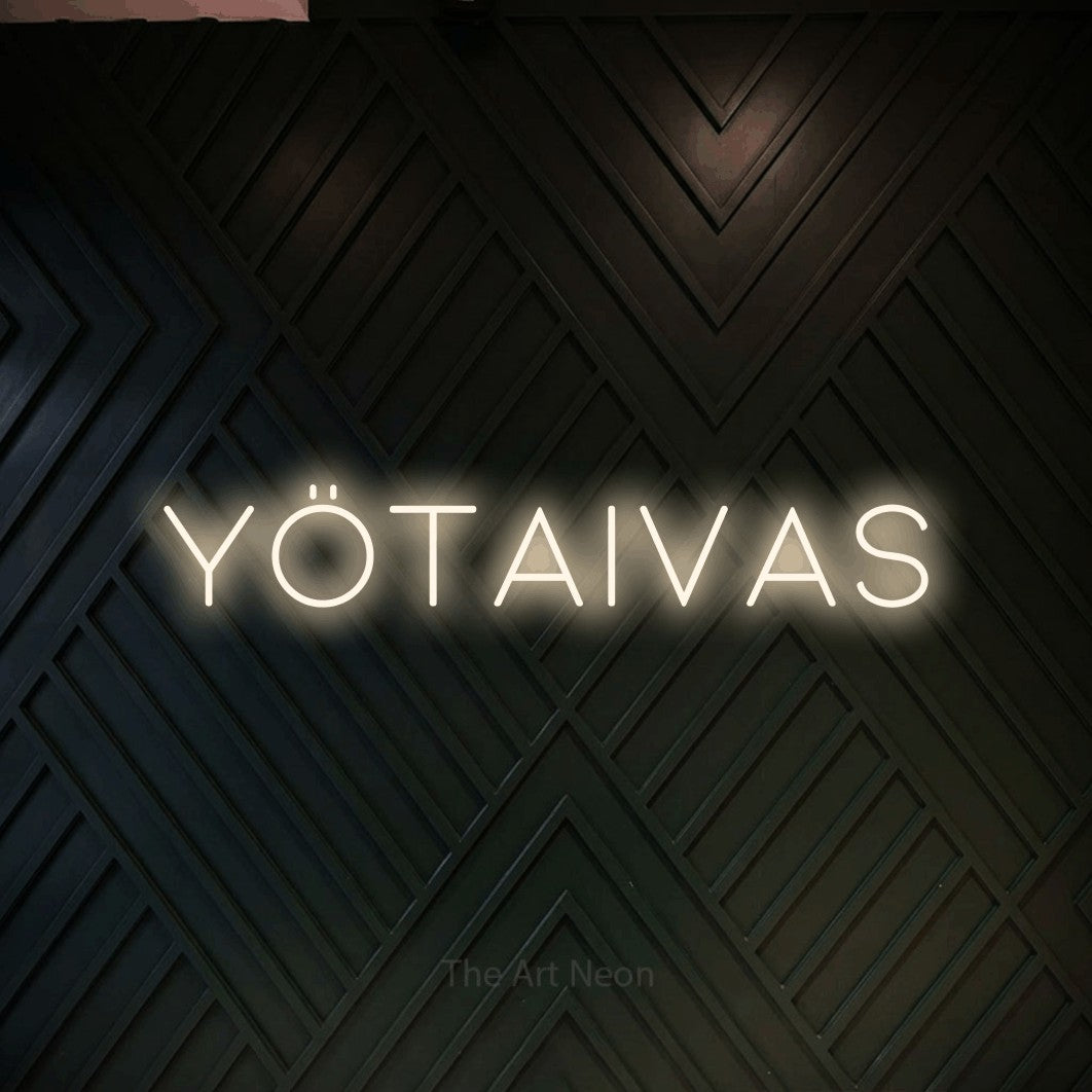 LED neon sign reading “Yötaivas”, arranged in a single line.