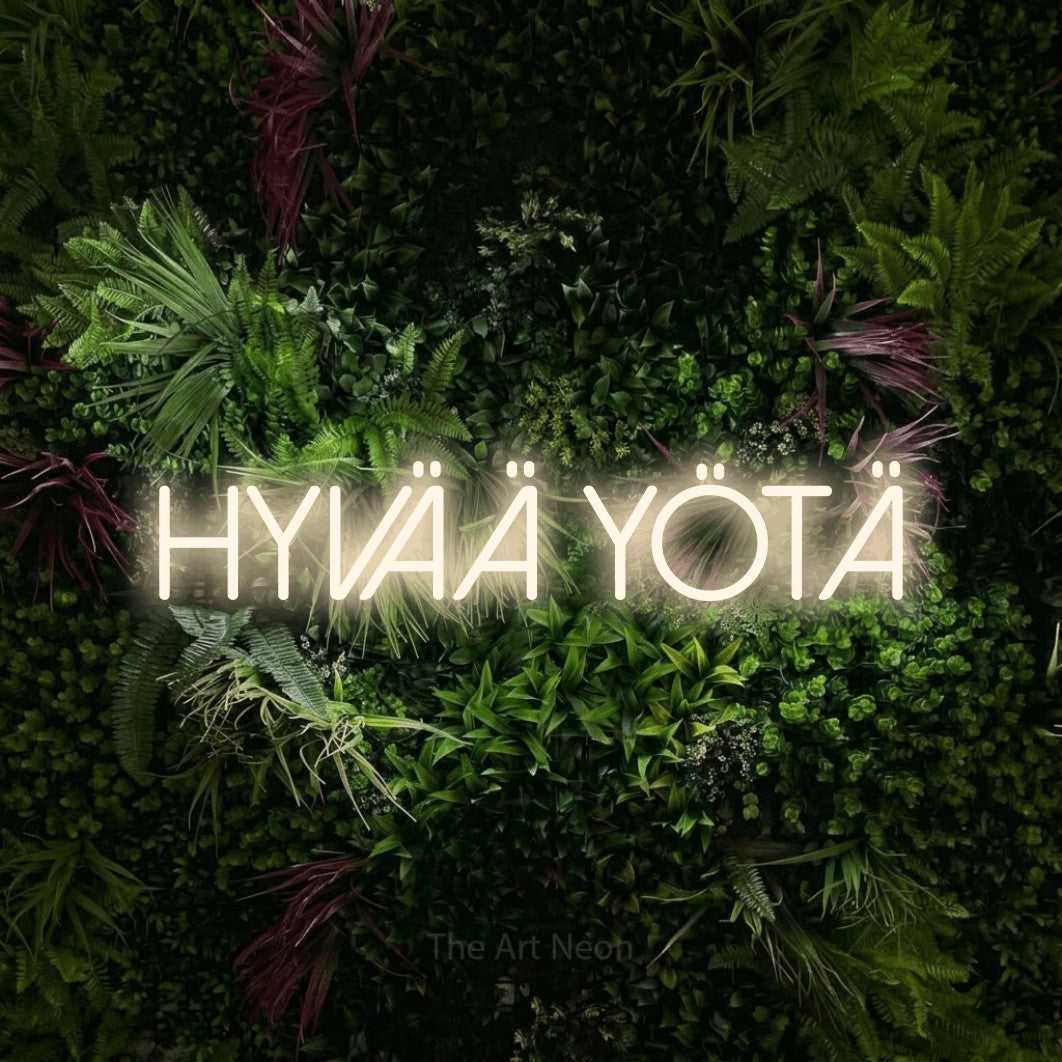 LED neon sign reading “Hyvää yötä”, arranged in a single line.