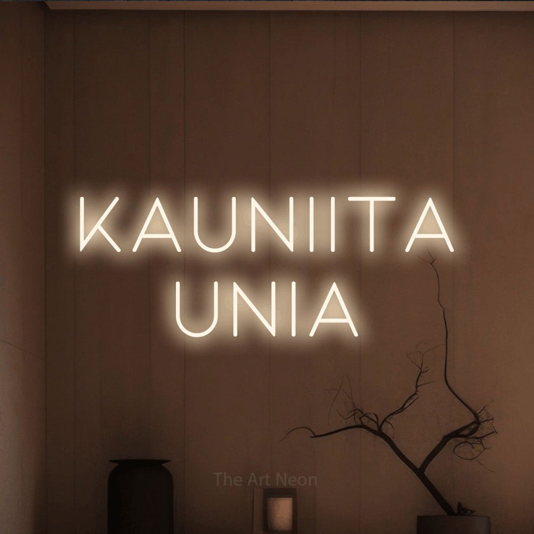 LED neon sign reading “KAUNIITA UNIA”, arranged in 2 lines.