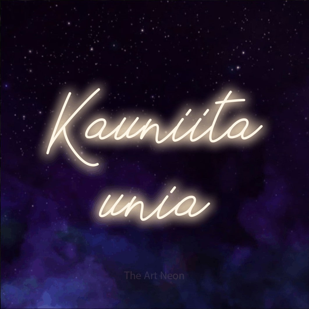 LED neon sign reading “Kauniita unia”, arranged in 2 lines.