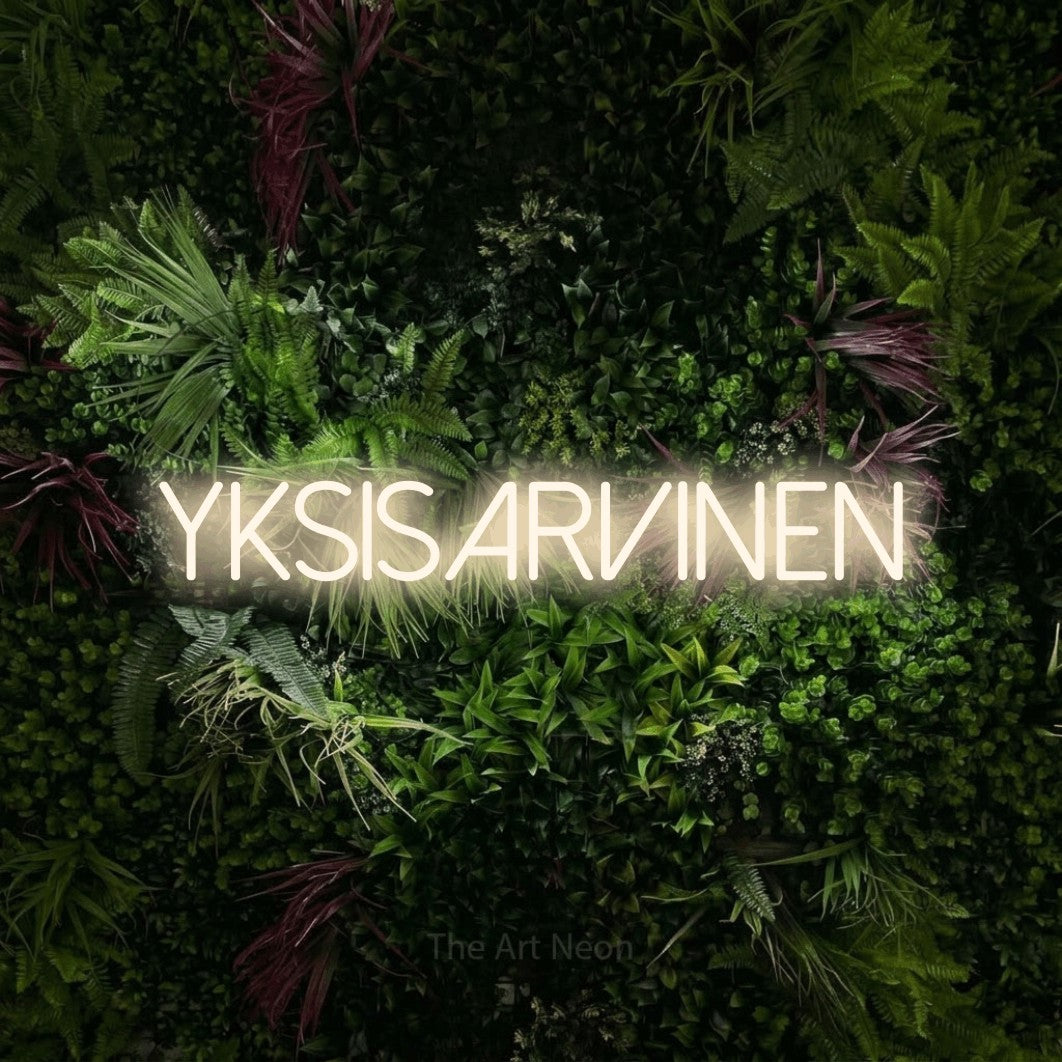 LED neon sign reading “Yksisarvinen”, arranged in a single line.