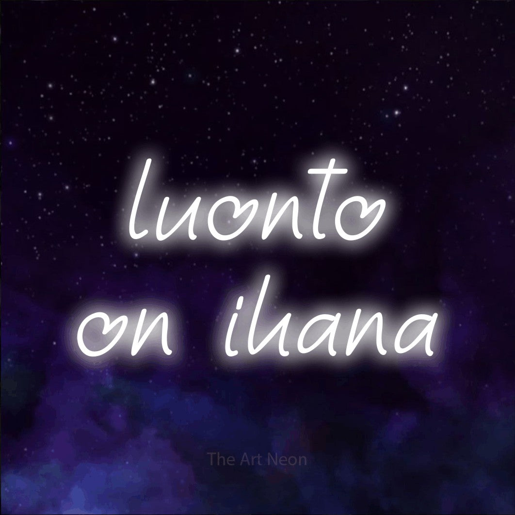 LED neon sign reading “luonto on ihana”, arranged in 2 lines.
