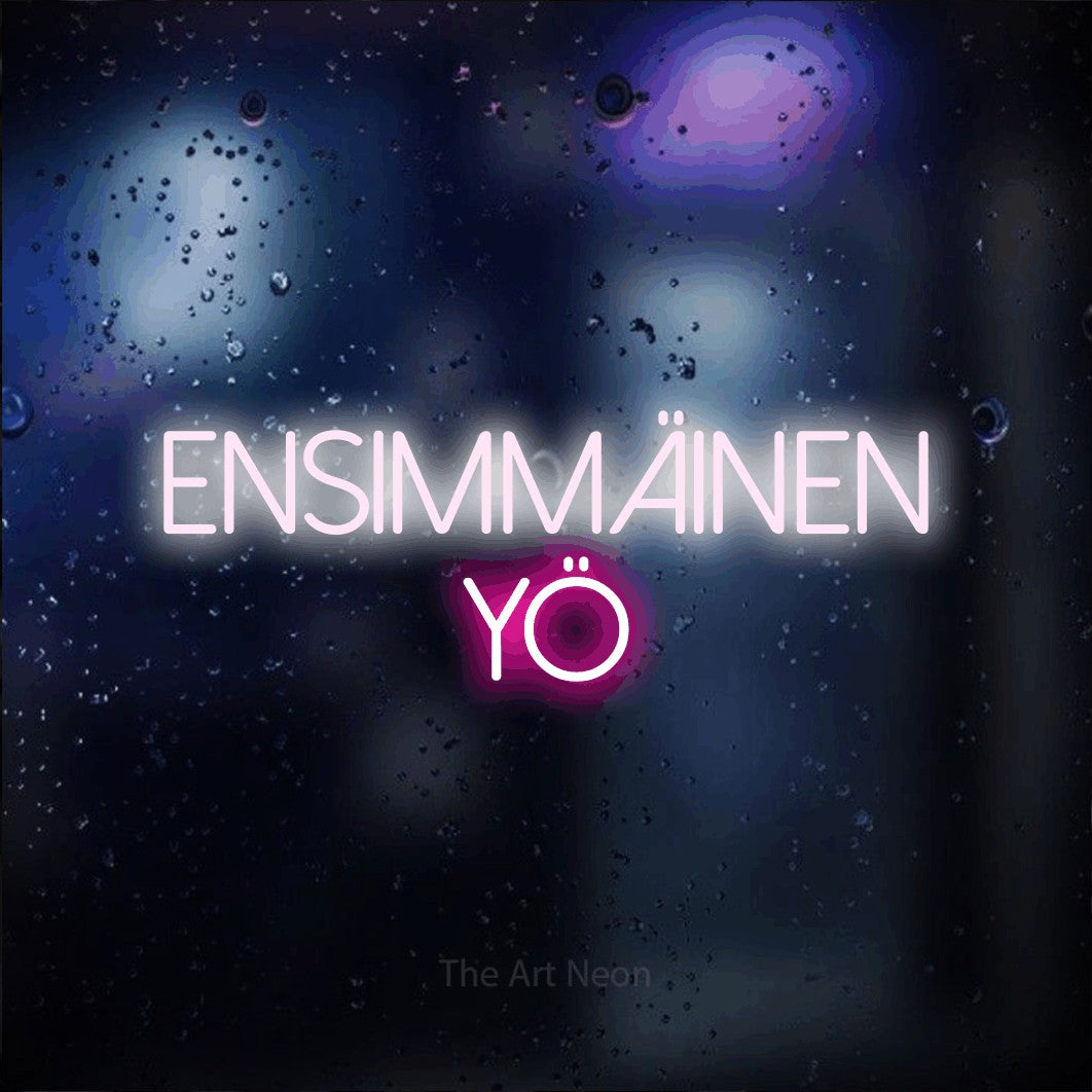 LED neon sign reading “ENSIMMÄINEN YÖ”, arranged in 2 lines.