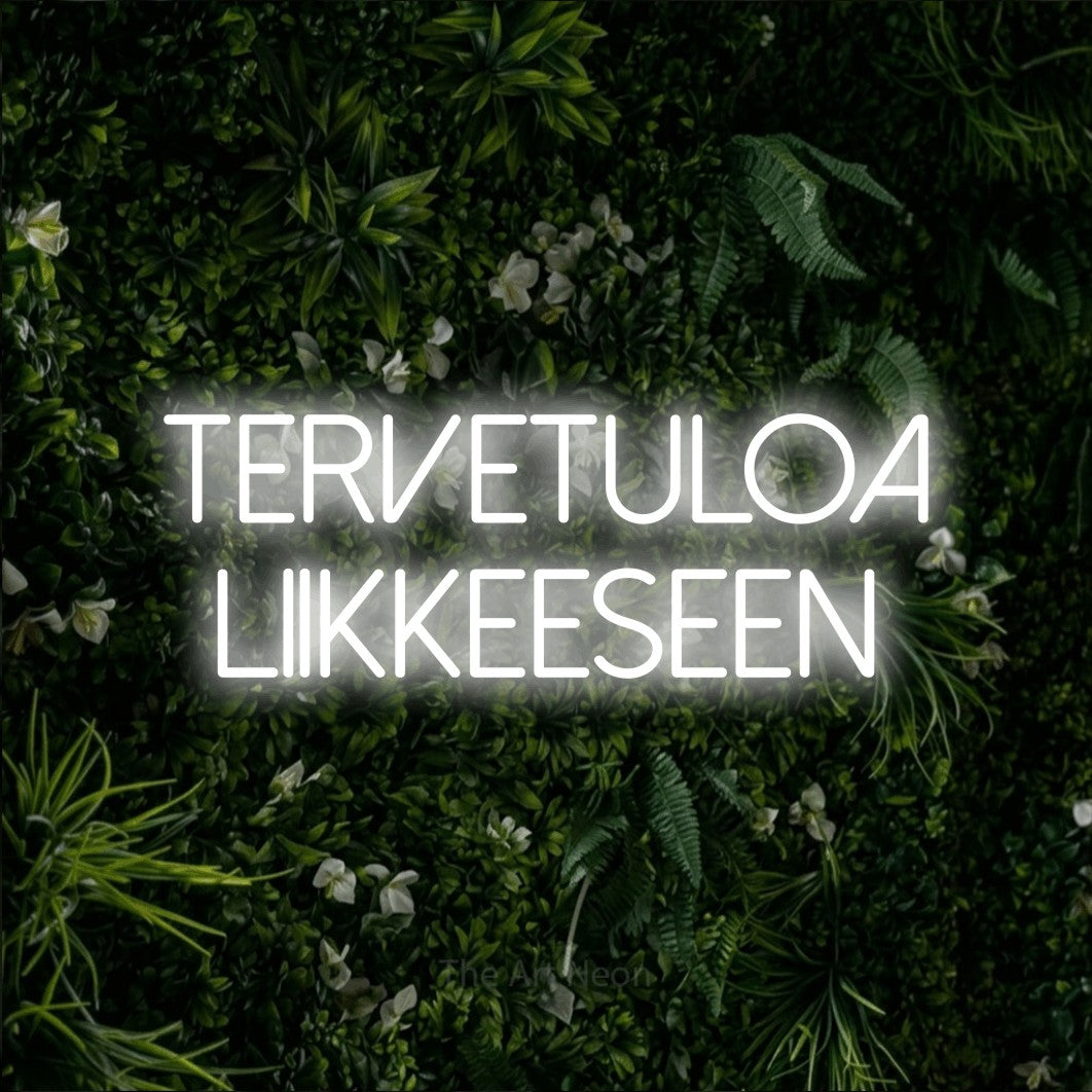 LED neon sign reading “tervetuloa liikkeeseen”, arranged in 2 lines.