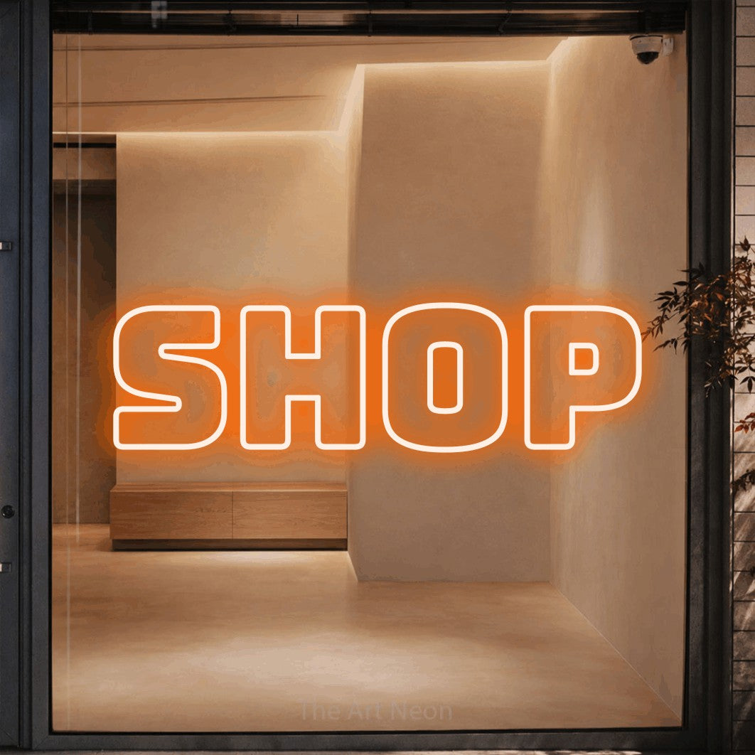LED neon sign reading “Shop”, arranged in a single line.
