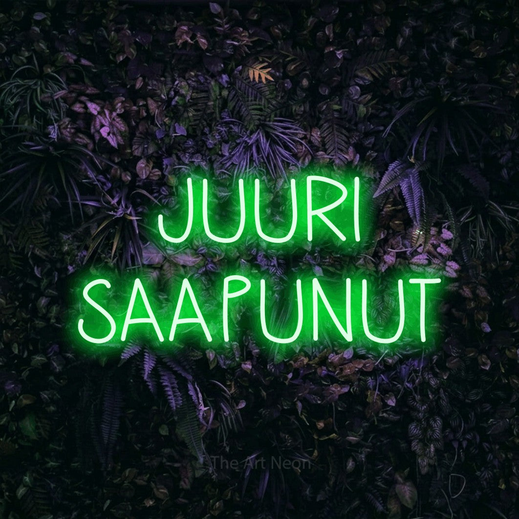 LED neon sign reading “JUURI SAAPUNUT”, arranged in 2 lines.