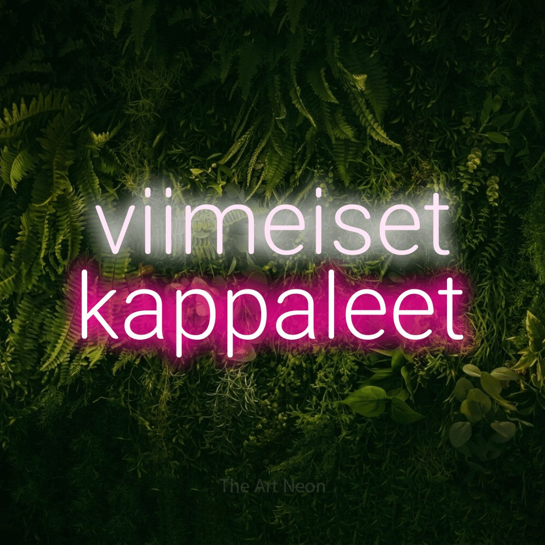 LED neon sign reading “viimeiset kappaleet”, arranged in 2 lines.