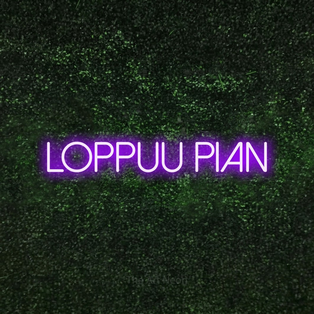 LED neon sign reading “Loppuu pian”, arranged in a single line.