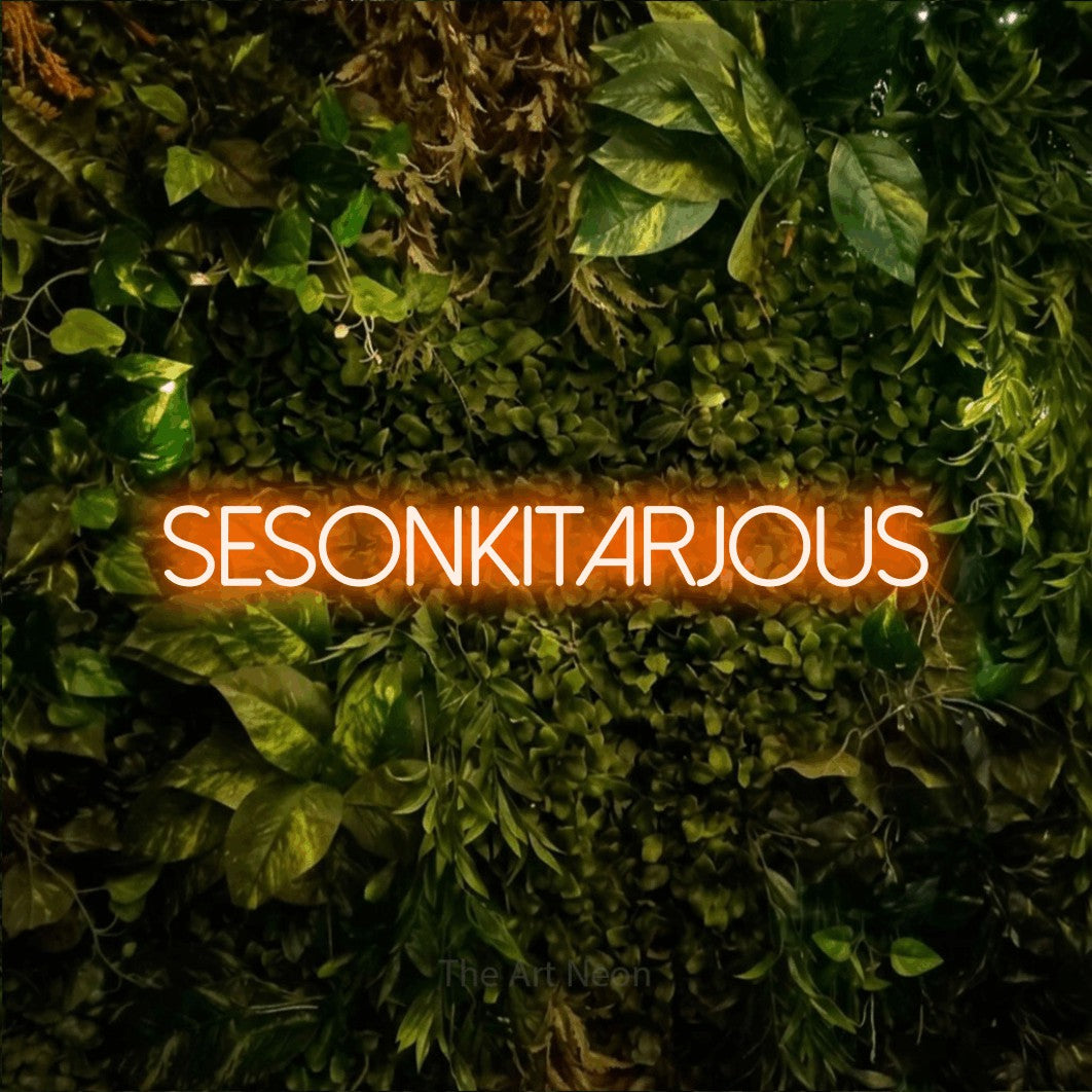 LED neon sign reading “Sesonkitarjous”, arranged in a single line.