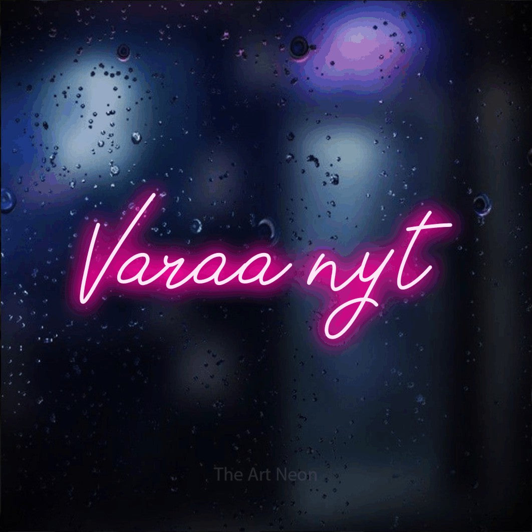 LED neon sign reading “Varaa nyt”, arranged in a single line.
