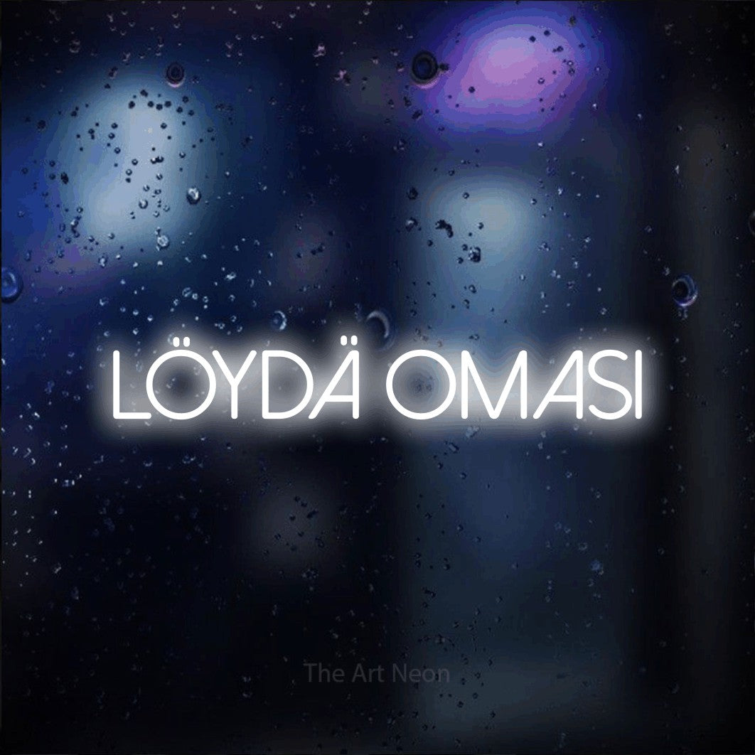 LED neon sign reading “Löydä omasi”, arranged in a single line.