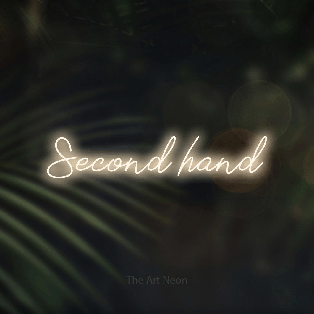 LED neon sign reading “Second hand”, arranged in a single line.