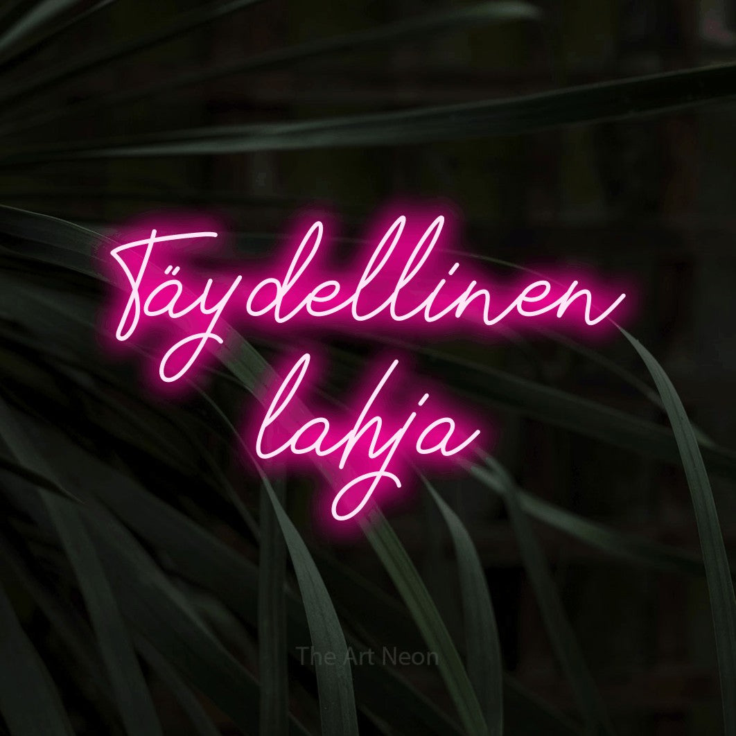 LED neon sign reading “Täydellinen lahja”, arranged in 2 lines.