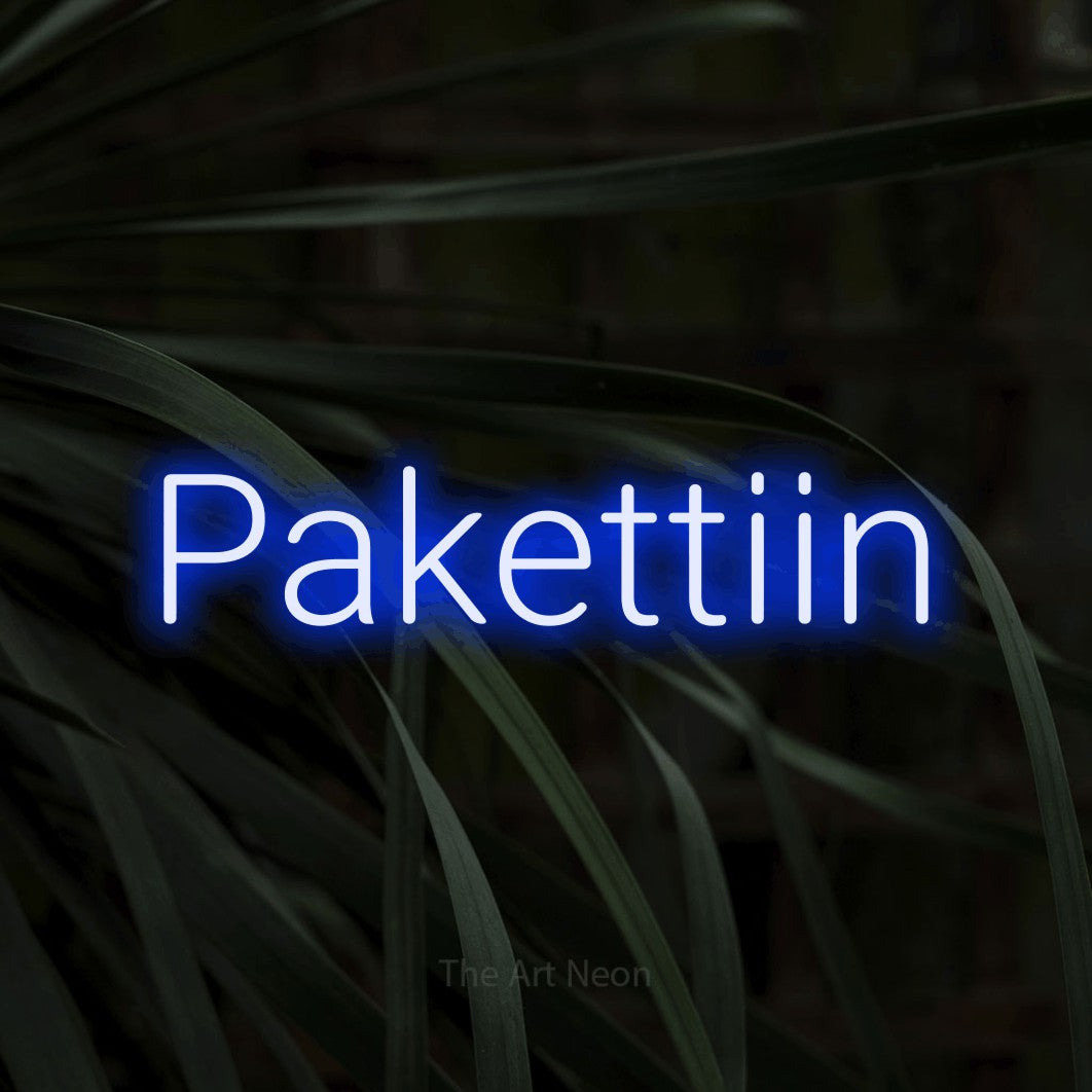 LED neon sign reading “Pakettiin”, arranged in a single line.
