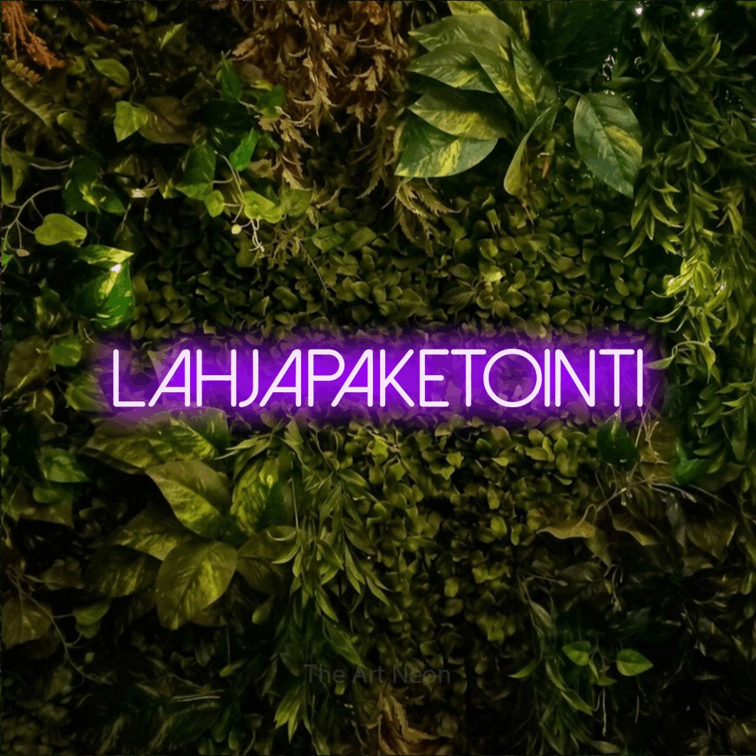LED neon sign reading “LAHJAPAKETOINTI”, arranged in a single line.
