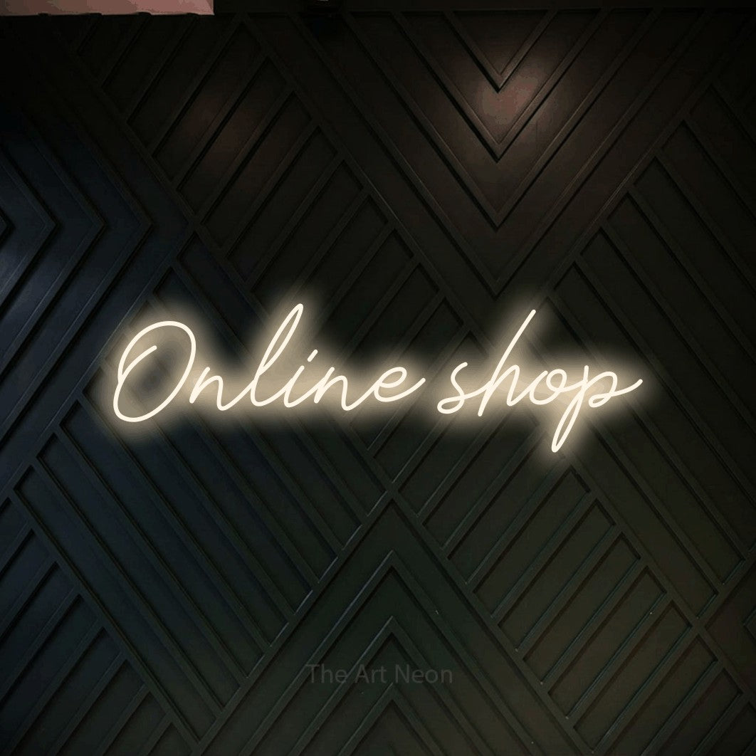 LED neon sign reading “Online shop”, arranged in a single line.