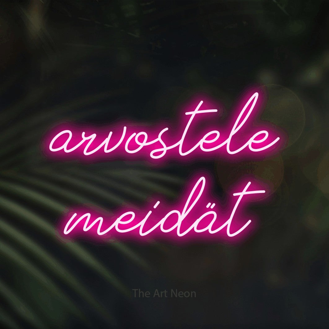 LED neon sign reading “arvostele meidät”, arranged in 2 lines.