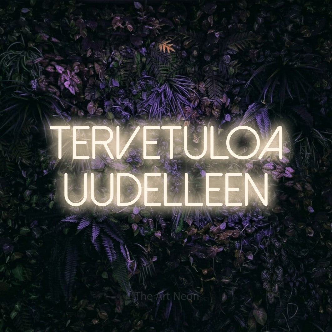 LED neon sign reading “TERVETULOA UUDELLEEN”, arranged in 2 lines.