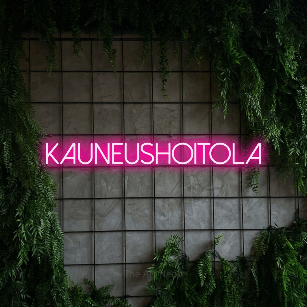 LED neon sign reading “Kauneushoitola”, arranged in a single line.