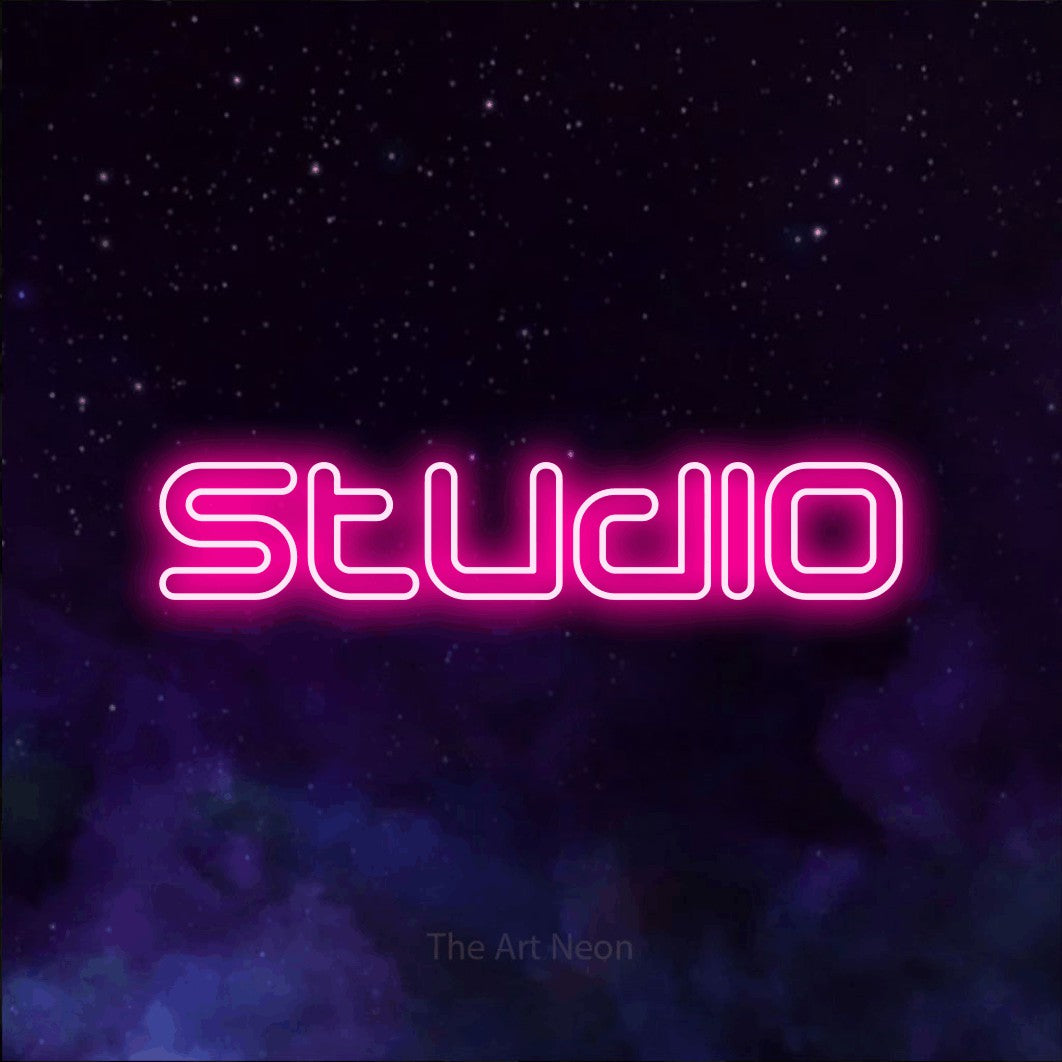 LED neon sign reading “Studio”, arranged in a single line.
