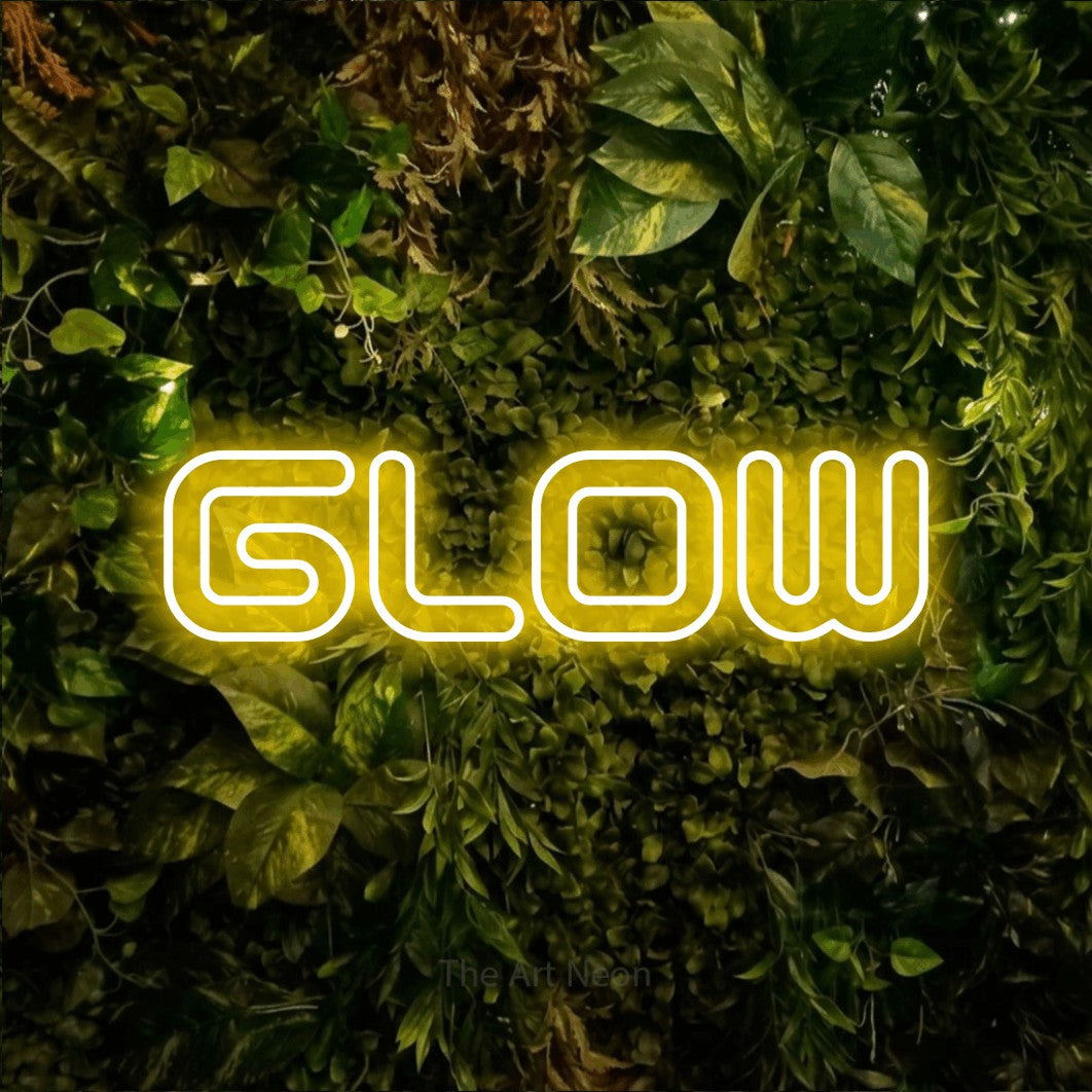 LED neon sign reading “Glow”, arranged in a single line.