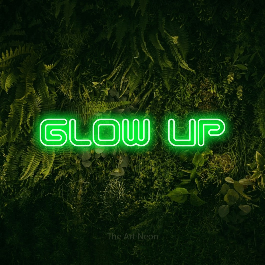 LED neon sign reading “Glow up”, arranged in a single line.