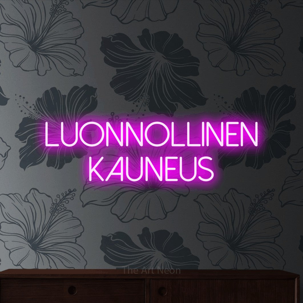 LED neon sign reading “LUONNOLLINEN KAUNEUS”, arranged in 2 lines.