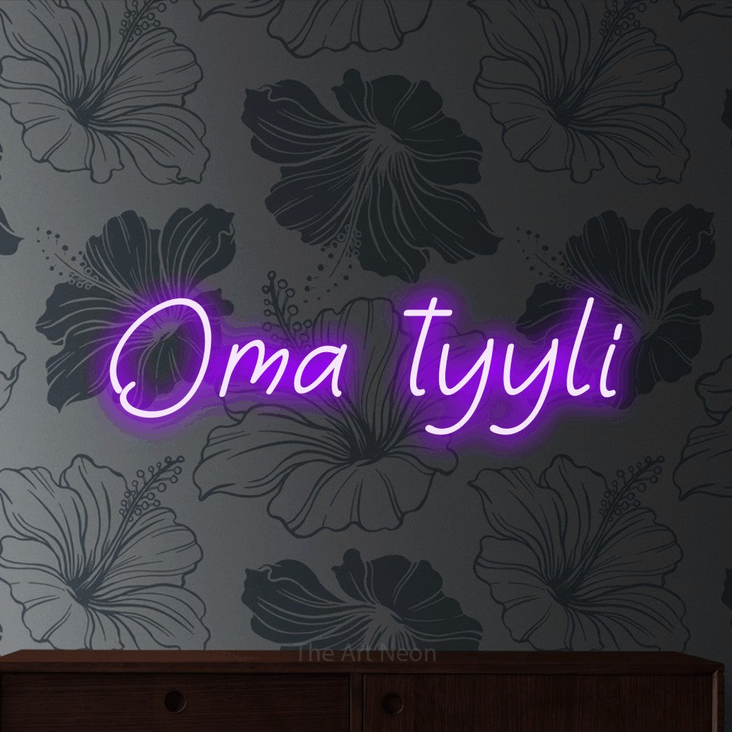 LED neon sign reading “Oma tyyli”, arranged in a single line.