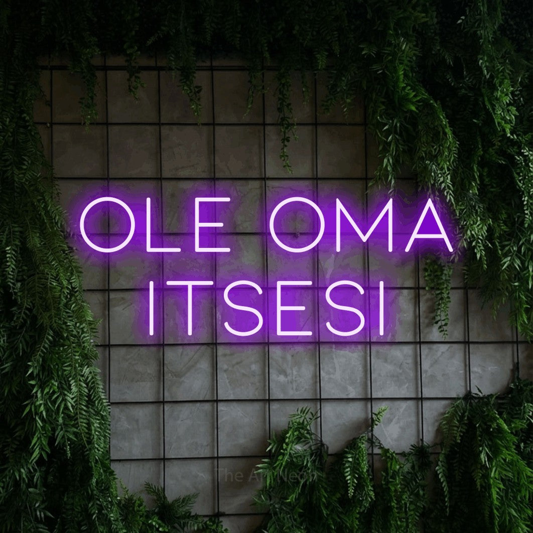 LED neon sign reading “ole oma itsesi”, arranged in 2 lines.