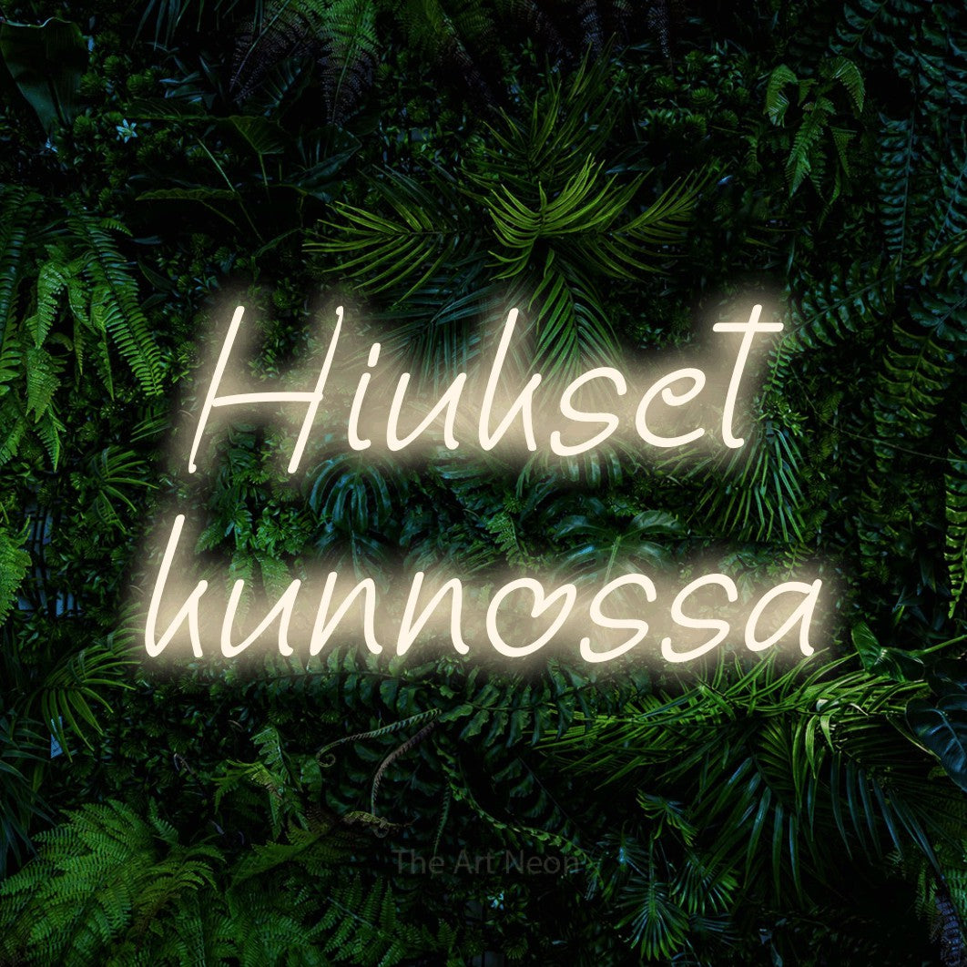 LED neon sign reading “Hiukset kunnossa”, arranged in 2 lines.