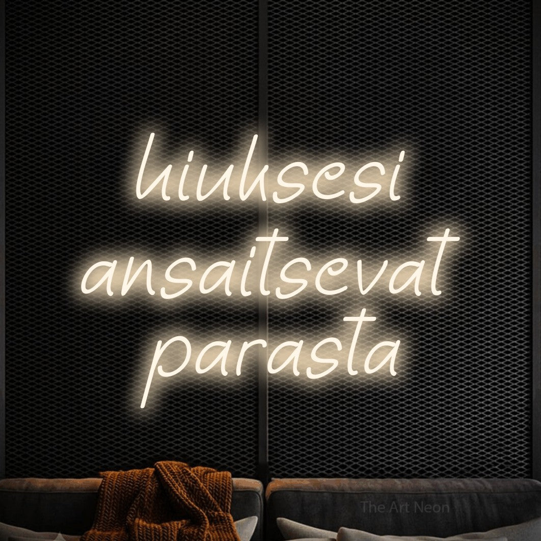 LED neon sign reading “hiuksesi ansaitsevat parasta”, arranged in 3 lines.