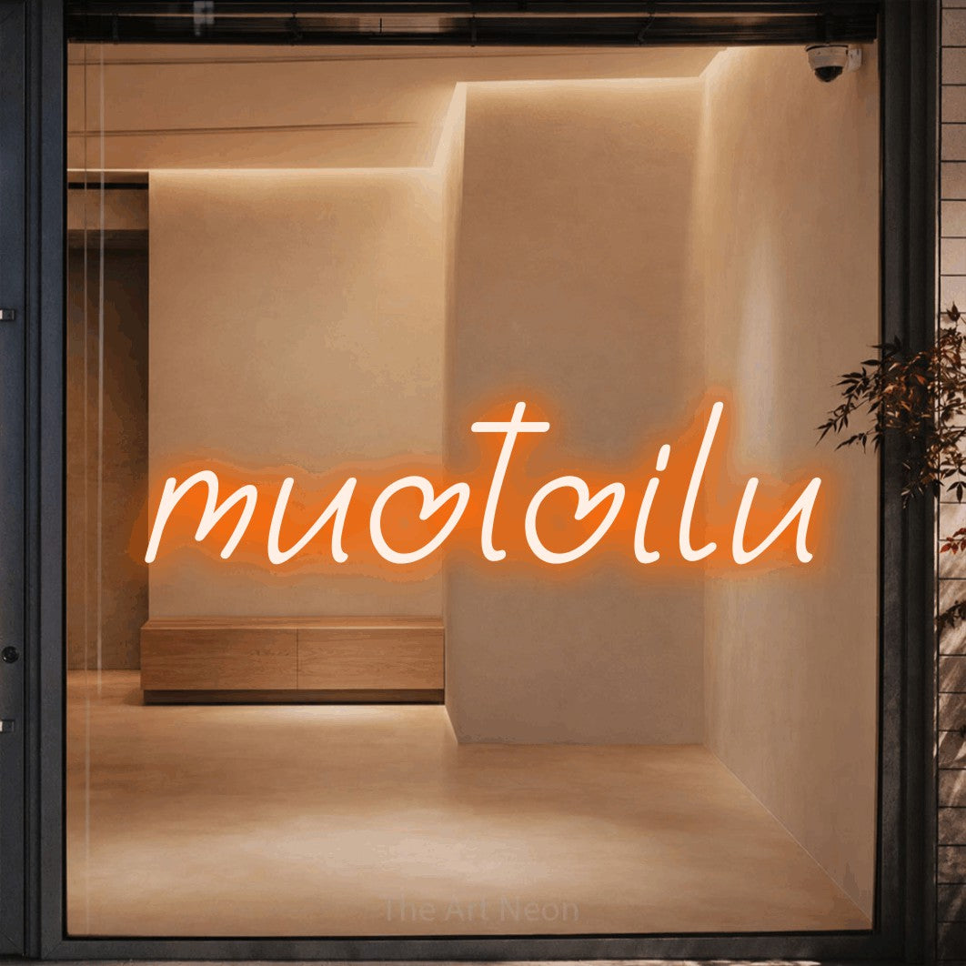 LED neon sign reading “muotoilu”, arranged in a single line.